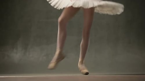 Ballerina Dancing in Studio