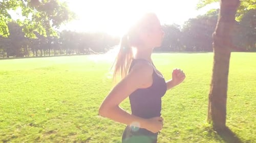 Runner Woman Running in Park Exercising Outdoors 1