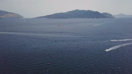 Aerial View of Boats Sailing on the Blue Sea