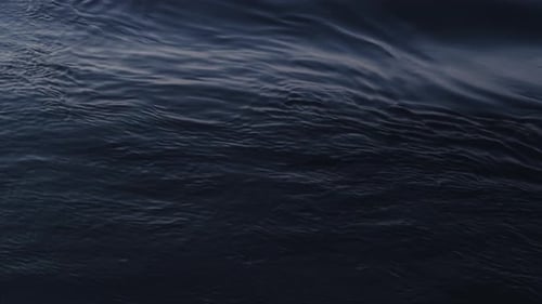 Blue Ocean Water Ripples in the Daytime
