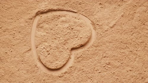 Heart Shape in Tan Colored Powder
