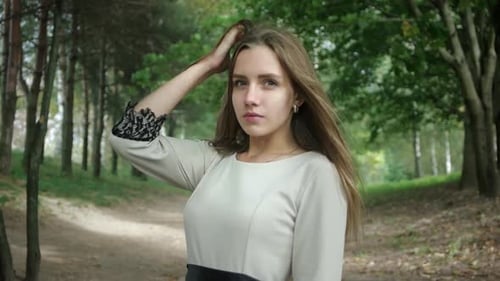 Young Woman Posing in a Park