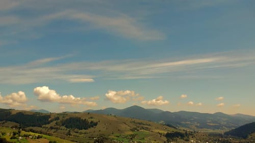 Beautiful View of Countryside Village and Mountain in Summer