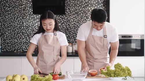 Couple Prepares Healthy Food in Modern Kitchen