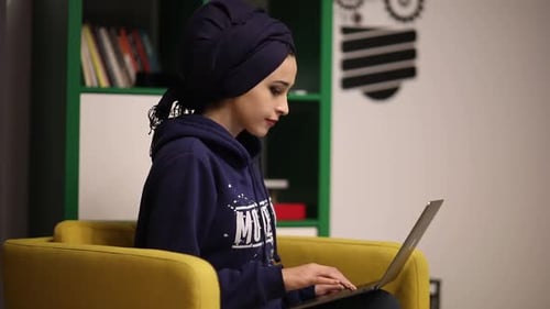 Businesswoman Working On Laptop
