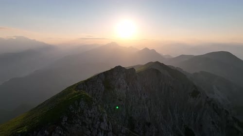 Aerial hikers in the Dolomites mountains at sunrise