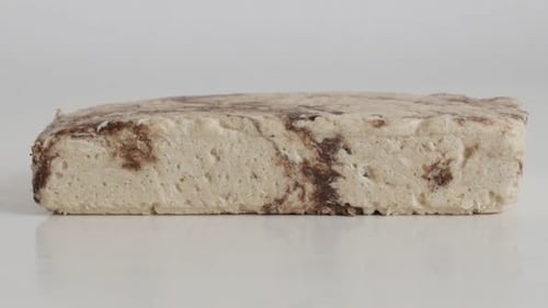 Middle Eastern sesame halva slow tilt 4K footage
