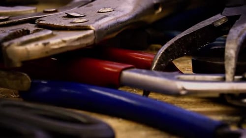 Camera dollies across old and grimy tools