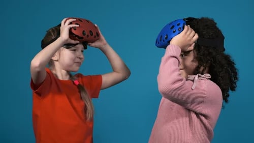 Girls Wearing VR Headsets