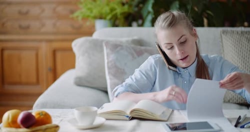 Woman Talking on Smartphone - Home Office