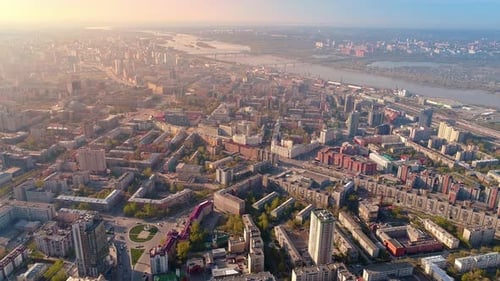Aerial Flight Over the Center of a Big City on the River