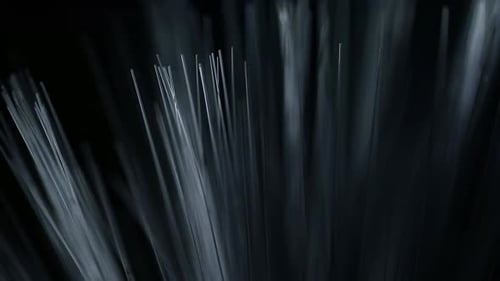 Fiber Optic Strands Swaying with Vibrant Light