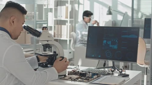 Scientists Working in Advanced Tech Lab