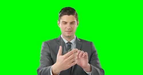 Man Typing on Smartphone on Green Screen Background