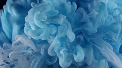 Blue and White Acrylic Paint Mixed in Water on Abstract Meditative Background