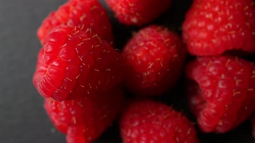 Fresh Ripe Raspberries in a Pile Close Up