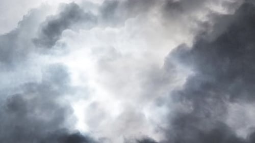 flying through cumulonimbus clouds and thunderstorms in the dark sky