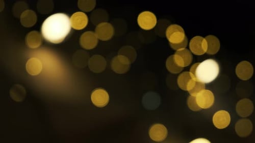Golden Bokeh Lights Shimmering in the Night