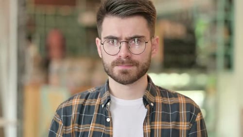 Man with Beard and Glasses Close Up