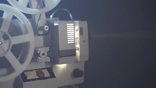 Vintage 8mm Film Projector Showing Movie