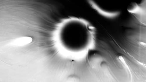 Goutte d'encre noire dans l'eau