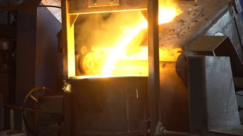 Molten Metal Pouring at Industrial Factory