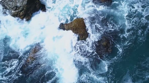 Raging Blue Sea Waves Breaking Over Big Wet Rock at Black Sea Coast