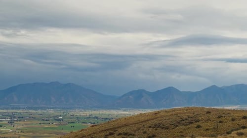 Time lapse of clouds moving over Utah Valley from West Mountain