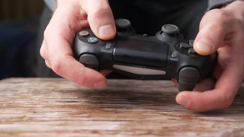 gaming game play tv fun gamer gamepad guy controller video console playing player holding hobby play