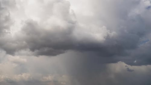 Dark Clouds Time-Lapse Against a Vibrant Blue Sky