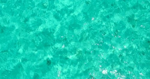 Daytime overhead abstract view of a sunshine white sandy paradise beach and blue sea background in h