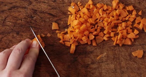 Dicing Carrots on a Cutting Board