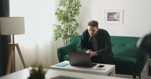 Young Man on Laptop Having a Video Call