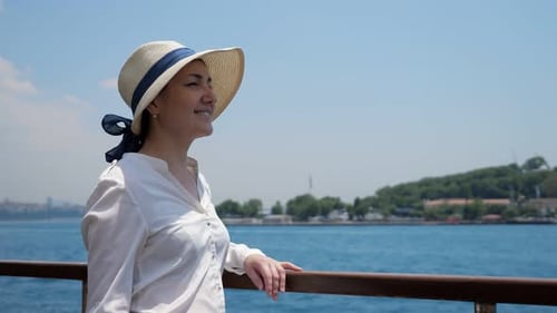 Woman Enjoying the Sea View from a Boat