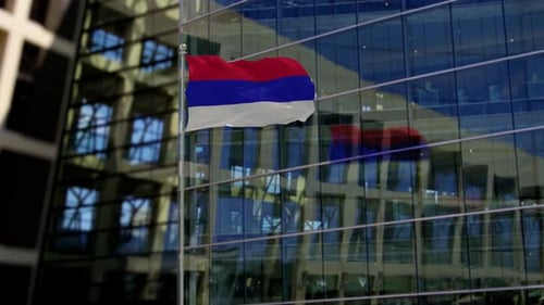 Waving Red Blue White Flag on Modern Corporate Building