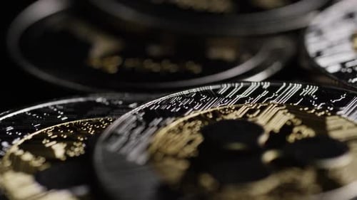 Ripple Coins Close Up on Black Background