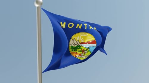 Montana State Flag Waving on Clear Blue Sky Background