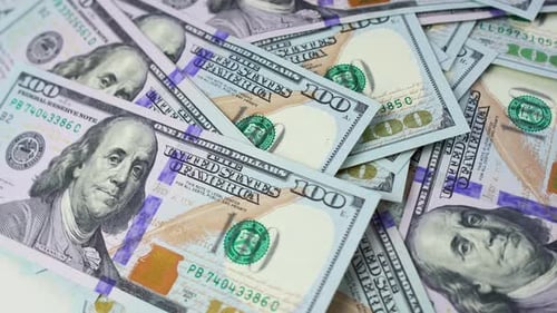 Pile of United States One Hundred Dollar Bills