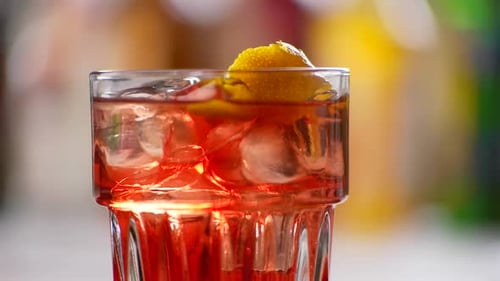 Refreshing Cocktail with Ice and Lemon Peel