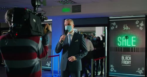 Man Presents at Corporate Black Friday Sale Event