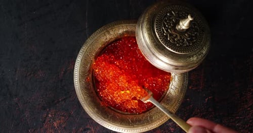 The Red Caviar Is Stirred with a Spatula