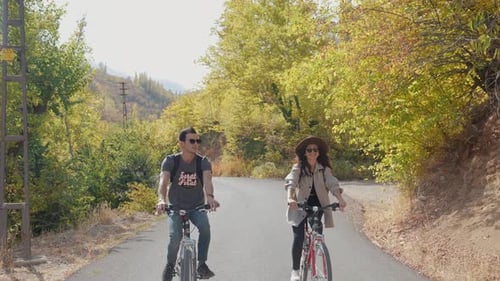 Romantic Couple Riding Bikes