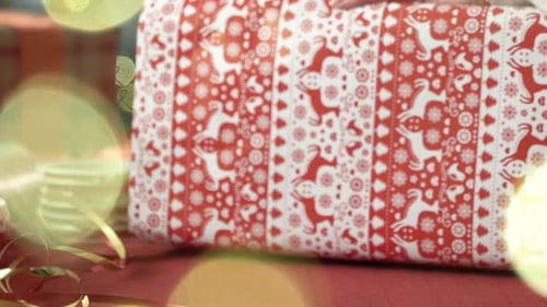 Close Up of Person Wrapping a Christmas Gift