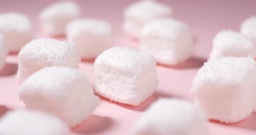 Marshmallow candy on pink