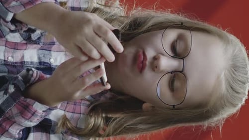 Child eating cream filled cookie snack