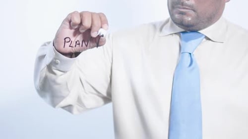 Man Writes Plan A with Marker
