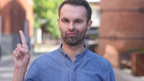 No Casual Man Rejecting Offer By Waving Finger