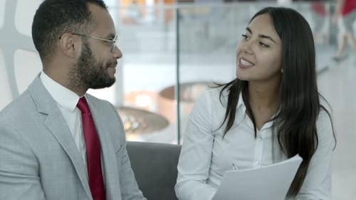 Business Professionals Collaborate in Modern Office Setting