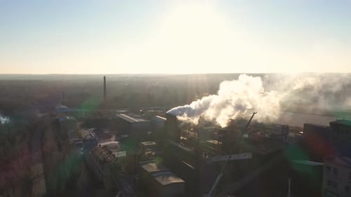 Aerial Shot of Smoke Pouring From Chemical Factory Into Atmosphere