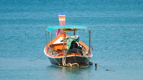 Longtail Motorboat Near Beach